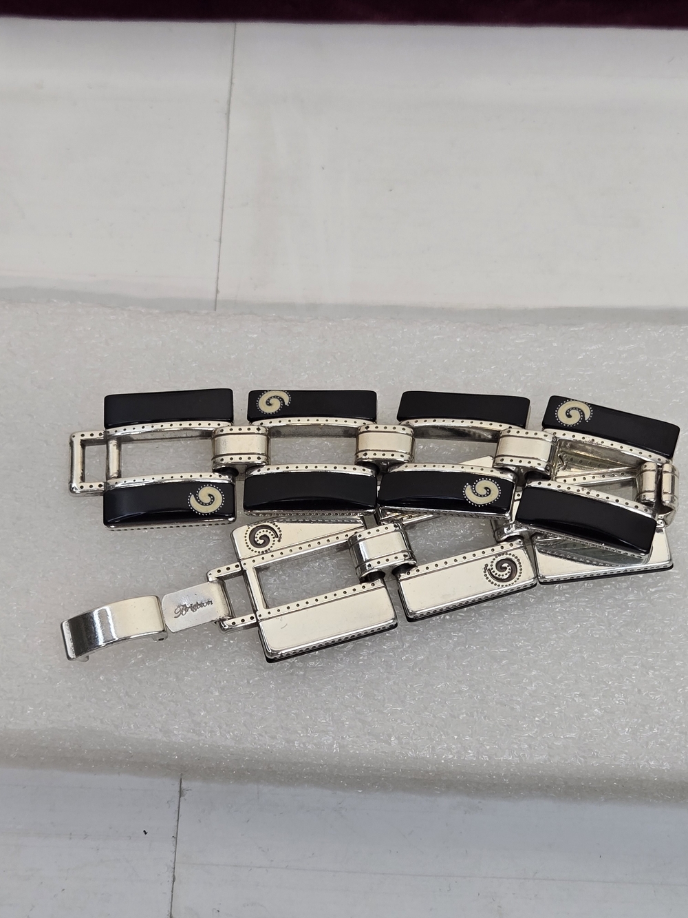 Brighton Silver and Black Link Bracelet with Enamel Swirl Accents